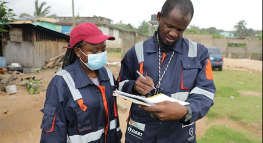 Menxons field personnel recording geological data during onshore field activity